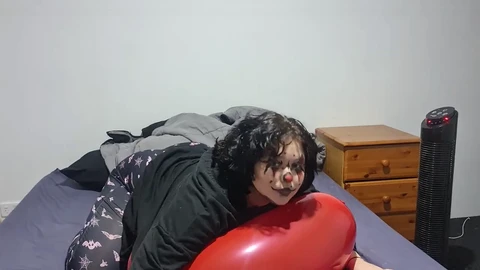 Busty BBW enjoys deep-throat balloon play with clown girl